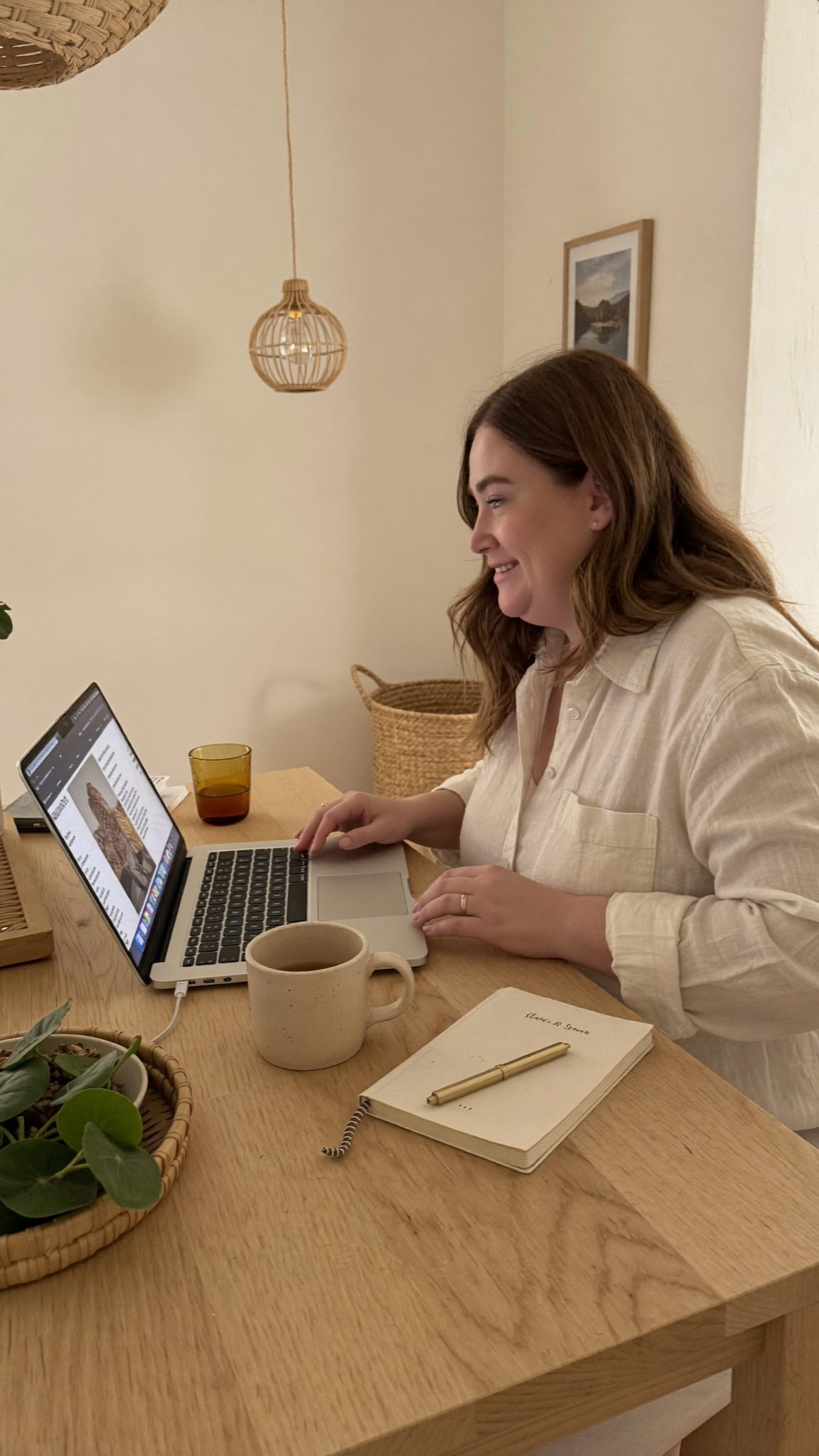 Kaylie Morrell planning travel at her desk