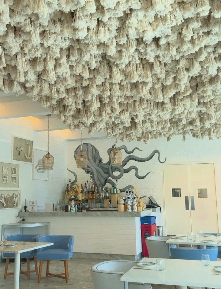 Design-led restaurant interior at SLS Playa Mujeres